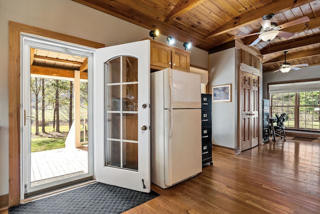 kitchen with white fridge, a wealth of natural light, and wooden ceiling