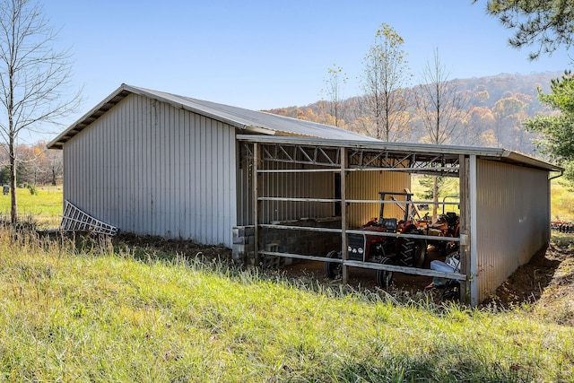 view of outdoor structure featuring a mountain view