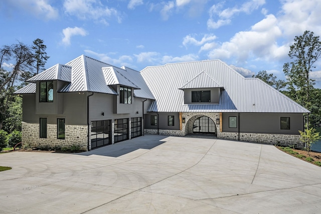 view of front of property with a garage