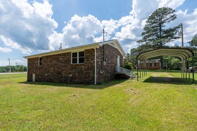 view of home's exterior with a carport and a lawn