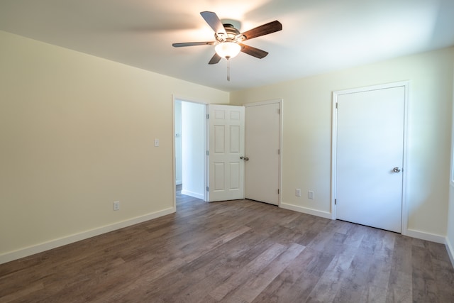 unfurnished bedroom featuring ceiling fan and wood-type flooring