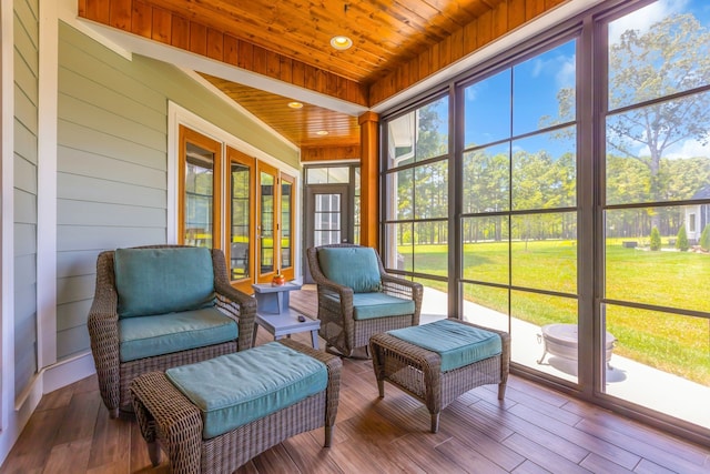 sunroom / solarium featuring wooden ceiling