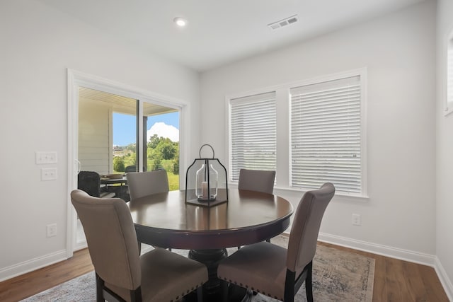 dining area featuring hardwood / wood-style flooring