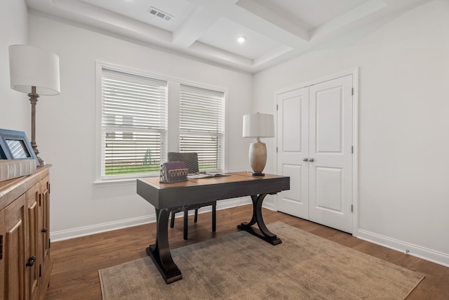 office area featuring beamed ceiling, dark wood-type flooring, and coffered ceiling