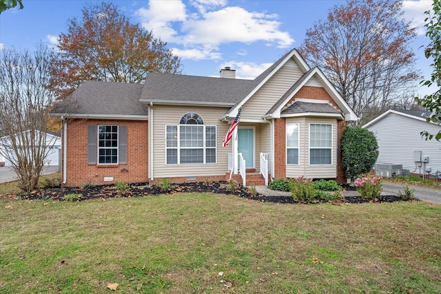 view of front of property with a front lawn