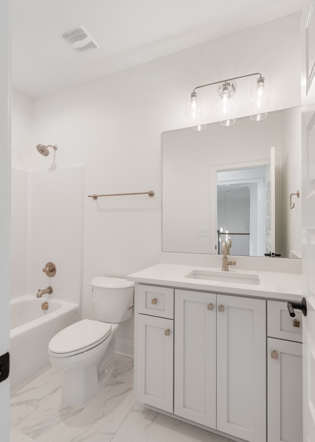 full bathroom featuring vanity, shower / bathing tub combination, and toilet