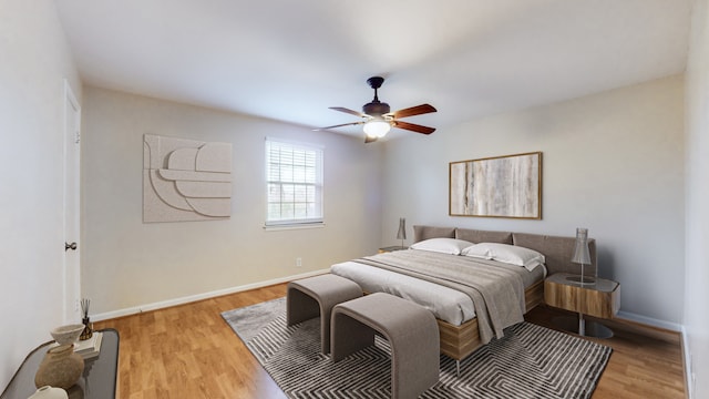 bedroom featuring ceiling fan and light hardwood / wood-style floors