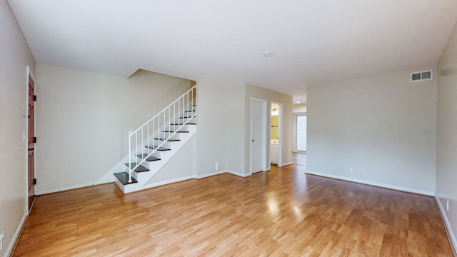 unfurnished room featuring light hardwood / wood-style flooring