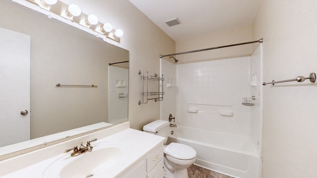 full bathroom with vanity, shower / bath combination, and toilet