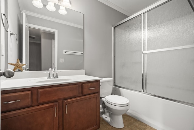 full bathroom with tile patterned floors, bath / shower combo with glass door, vanity, crown molding, and toilet