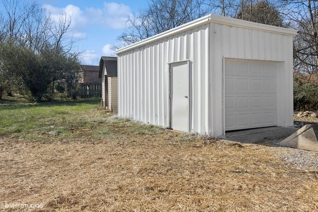 view of outbuilding featuring a garage