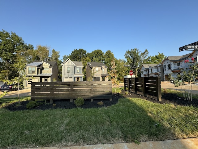 surrounding community featuring a lawn