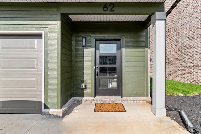 property entrance featuring a garage