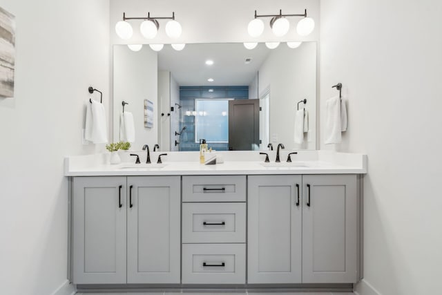 bathroom with vanity and an enclosed shower