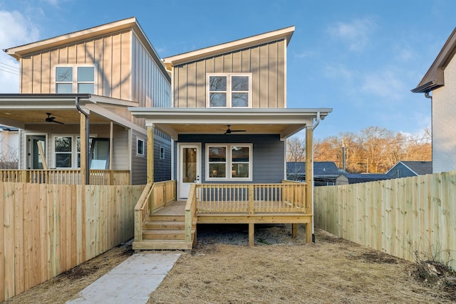 view of front of property with a deck and ceiling fan