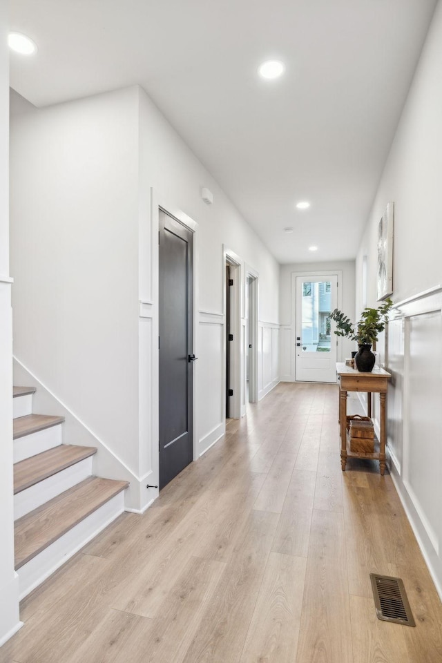 hallway featuring light hardwood / wood-style floors