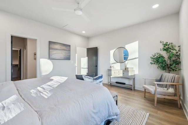 bedroom featuring light wood-type flooring and ceiling fan