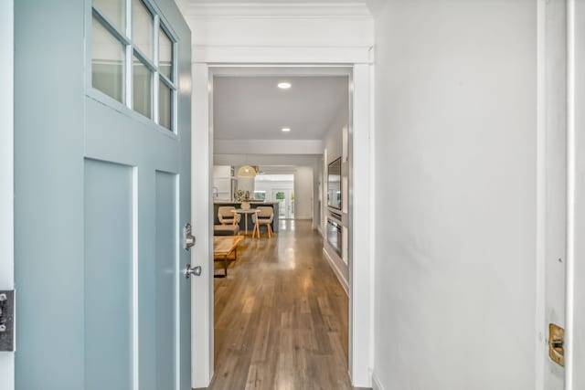 corridor featuring wood-type flooring