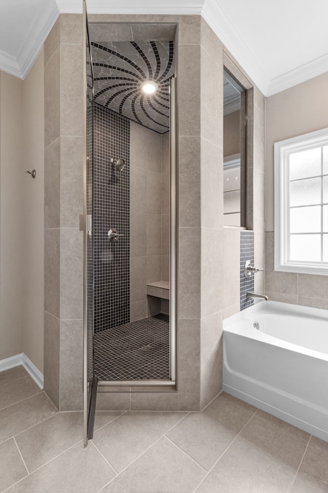 bathroom featuring separate shower and tub, crown molding, and tile patterned floors