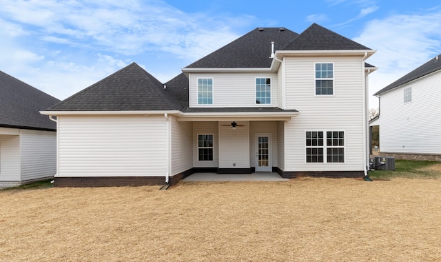 back of property with central AC unit, ceiling fan, and a patio