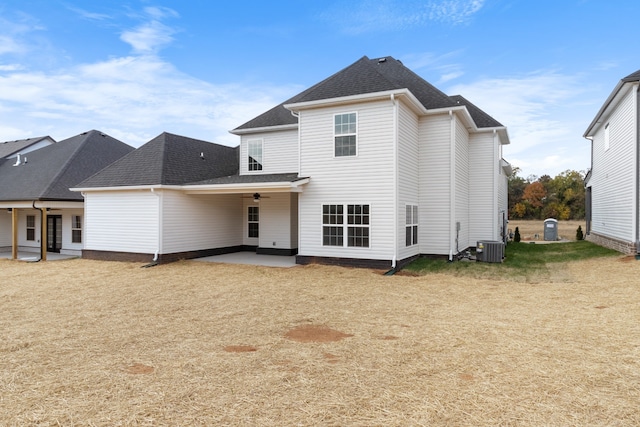 rear view of property with a patio area, ceiling fan, and central AC