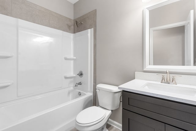 full bathroom featuring vanity,  shower combination, and toilet