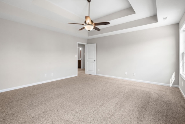 650 Woodrush Dr, Clarksville, TN 37040 - unfurnished room with a tray ceiling, ceiling fan, and carpet flooring