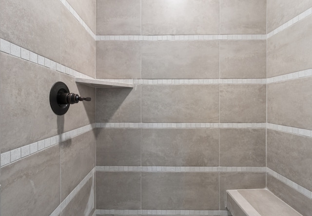 details featuring a tile shower