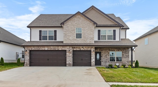 650 Woodrush Dr, Clarksville, TN 37040 - view of front of house featuring an attached garage, roof with shingles, a front yard, concrete driveway, and brick siding