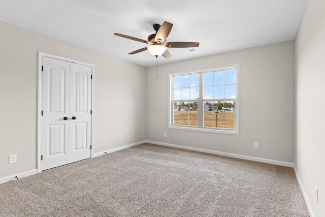 650 Woodrush Dr, Clarksville, TN 37040 - unfurnished bedroom featuring carpet flooring, a closet, and a ceiling fan