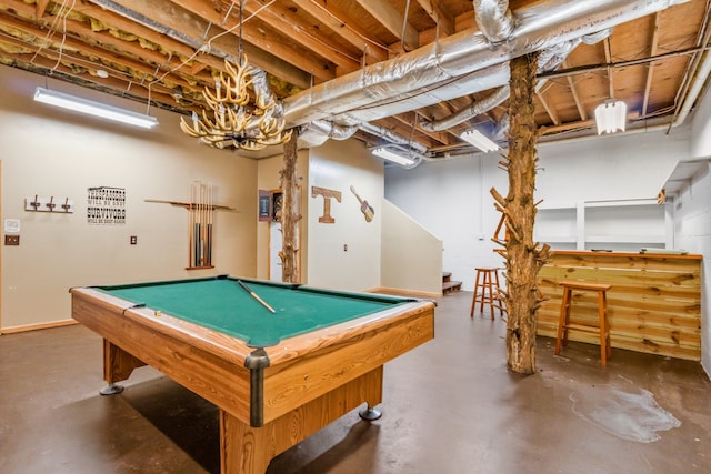 recreation room with billiards and concrete floors