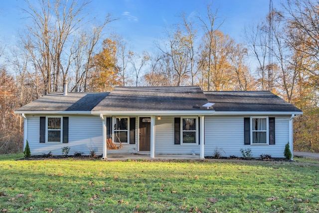 single story home featuring a front yard