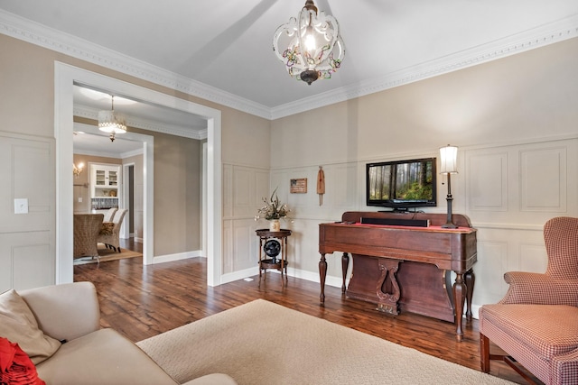 living room with crown molding and dark wood-type flooring