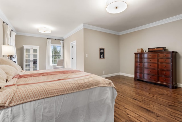 bedroom with dark hardwood / wood-style floors and crown molding