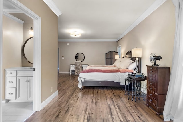 bedroom featuring wood-type flooring and ornamental molding