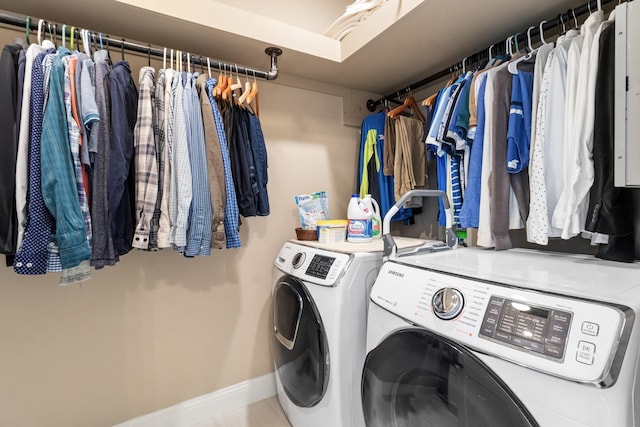 laundry room featuring washing machine and dryer