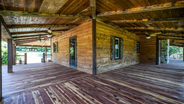 wooden deck featuring ceiling fan and a porch