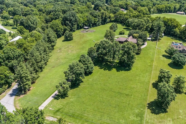 birds eye view of property with a rural view