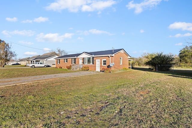 single story home with a front yard