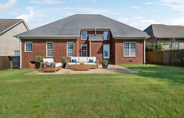 rear view of property with outdoor lounge area, a yard, and a patio