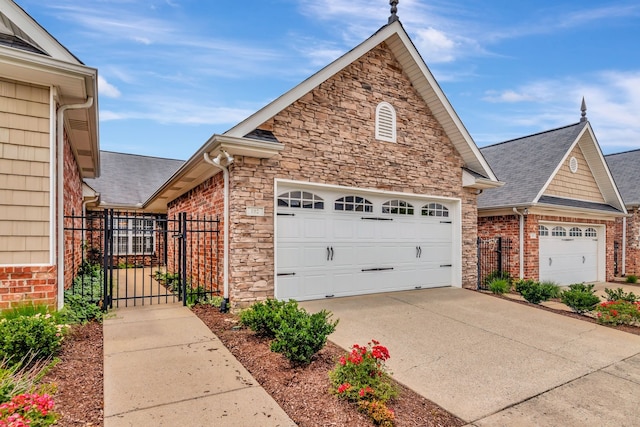 view of front of property with a garage