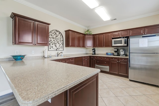 kitchen featuring kitchen peninsula, stainless steel fridge, white microwave, and crown molding