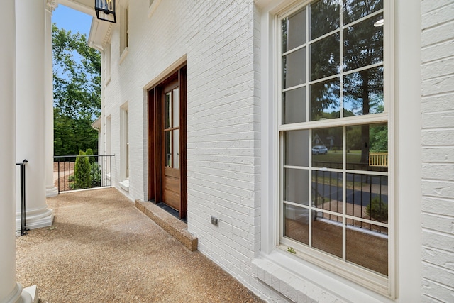 view of property exterior featuring covered porch