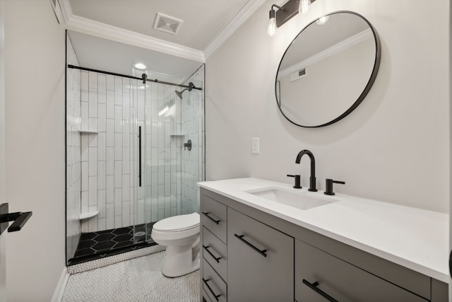 bathroom featuring tile patterned flooring, toilet, vanity, a shower with shower door, and ornamental molding