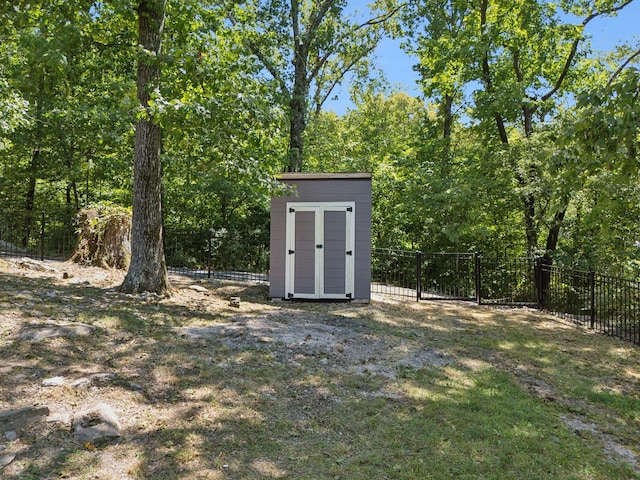 view of outdoor structure with a lawn