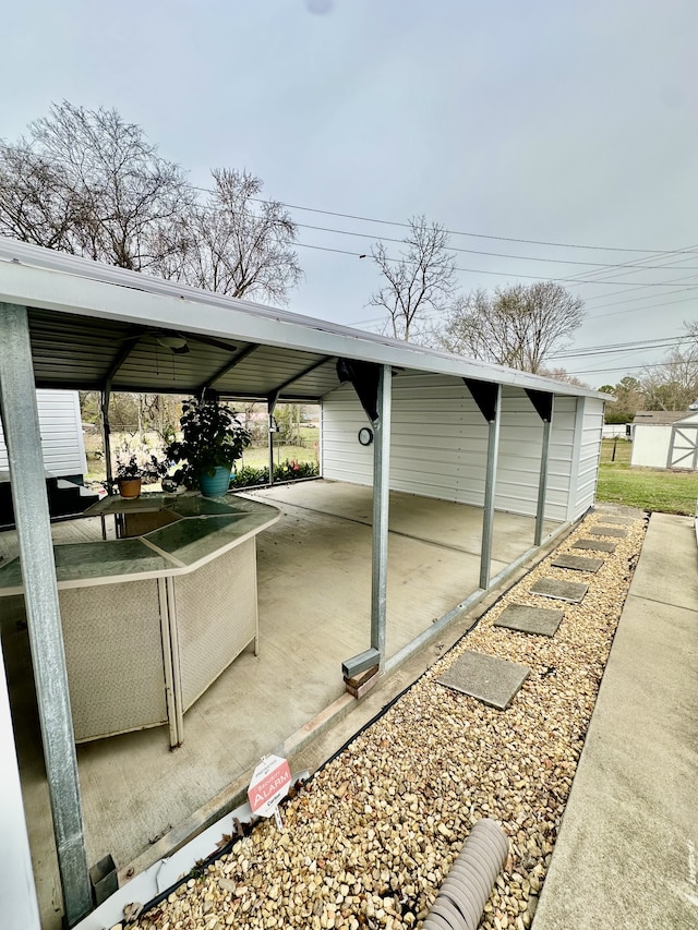 view of patio featuring a carport