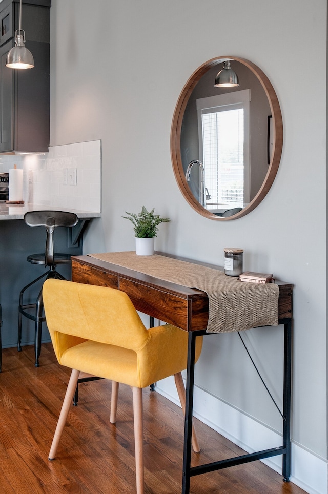 dining area with hardwood / wood-style flooring