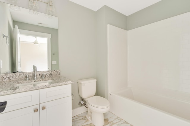 full bathroom featuring shower / washtub combination, vanity, and toilet