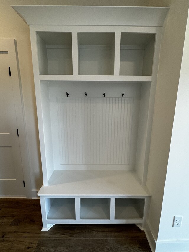 mudroom with dark hardwood / wood-style floors