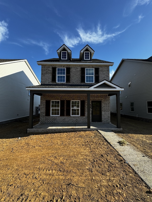 front facade with a porch